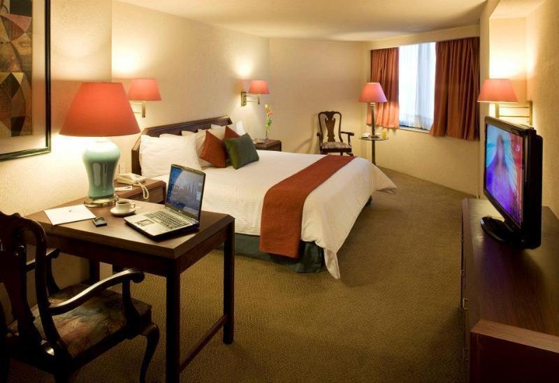 Hotel La Joya Pachuca Extérieur photo A typical room at the hotel
